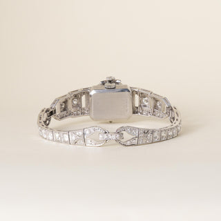 Vintage Rolex Platinum and 6 Carats Diamond Concealed Watch Cocktail Bracelet