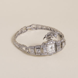 Vintage Rolex Platinum and 6 Carats Diamond Concealed Watch Cocktail Bracelet