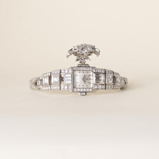Vintage Rolex Platinum and 6 Carats Diamond Concealed Watch Cocktail Bracelet
