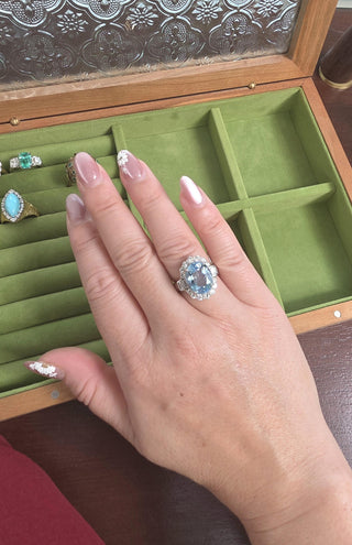 Vintage 1970s 6.47ct Oval Aquamarine 1.22ct Diamond Halo Baguette Ring Platinum