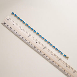 Estate 14K Yellow Gold Blue Topaz and Diamond Tennis Bracelet
