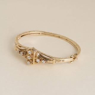 Vintage 1970s 14K Yellow Gold 0.60 Carat Diamond Filigree Bangle Bracelet