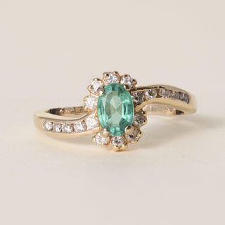 Vintage 14K Gold 0.50 Carat Emerald Oval and Diamond Halo Ring