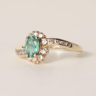 Vintage 14K Gold 0.50 Carat Emerald Oval and Diamond Halo Ring