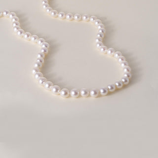 Vintage 14K Gold Cream Pearl Strand with Ruby Serpent Clasp