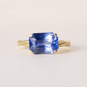 18K Gold 4.57 Carat Blue Sapphire GIA Emerald Cut Twisted Band Solitaire