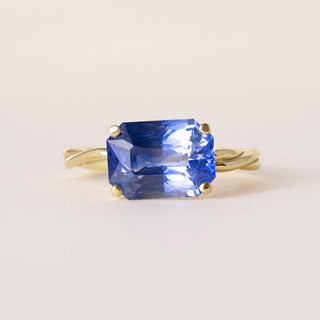 18K Gold 4.57 Carat Blue Sapphire GIA Emerald Cut Twisted Band Solitaire