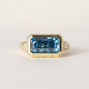 18K Gold 5.20 Carat Elongated Blue Zircon Emerald and Diamond Bezel Ring