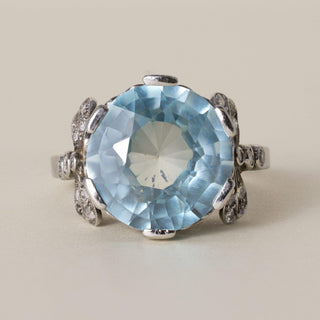 Antique Edwardian Platinum 7 Carat Blue Zircon Round Cut Ribbon Diamond Ring
