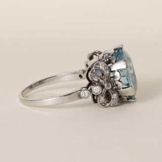 Antique Edwardian Platinum 7 Carat Blue Zircon Round Cut Ribbon Diamond Ring