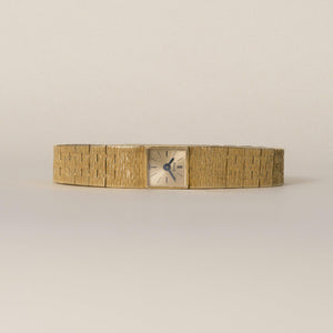 Vintage 1960s Piaget 18K Gold Square Champagne Dial Back Wind Bracelet Watch
