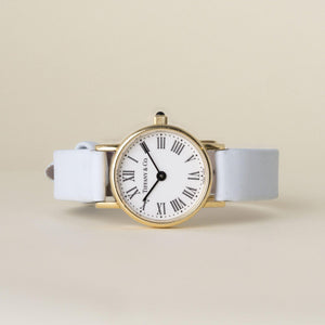 Vintage 18K Gold Tiffany and Co. Circle Dial Powder Blue Leather Strap Watch