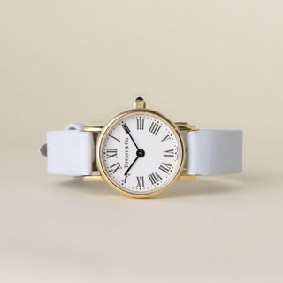 Vintage 18K Gold Tiffany and Co. Circle Dial Powder Blue Leather Strap Watch