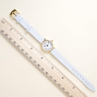 Vintage 18K Gold Tiffany and Co. Circle Dial Powder Blue Leather Strap Watch