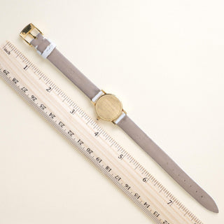 Vintage 18K Gold Tiffany and Co. Circle Dial Powder Blue Leather Strap Watch