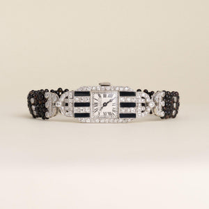 Art Deco Van Cleef & Arpels 2.50 Carats Diamond and Onyx Striped Wristwatch