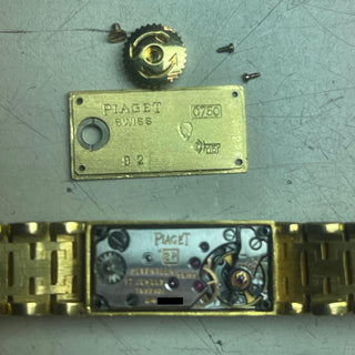 Vintage 1960s Piaget 18K Gold Square Champagne Dial Back Wind Bracelet Watch