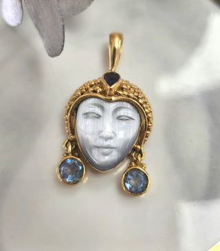 18K Yellow Gold Sajen Bali Goddess Carved Mother of Pearl, Sapphire Pendant