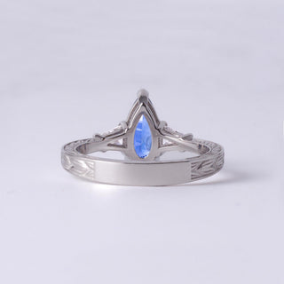 Stunning 2 Carat Pear-Shaped Sapphire Ring with Diamond Accents in Platinum